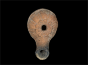 Oil lamp with a flower-decorated filling hole