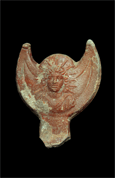 Handle of an oil lamp depicting Helios