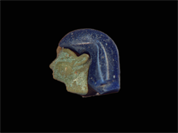Fragment of an inlay in the form of a head