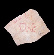 Ostracon bearing a red inscription