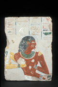 Fragment of  a wall of a tomb depicting a man and his wife