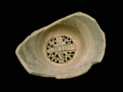 Pot strainer with a cross in the center 