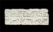 Fragment of a frieze decorated with crosses and bunches of grapes 