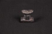 Headrest-shaped amulet 