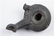 Oil lamp with a long nozzle 