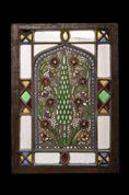Stained glass plaster window decorated with a Cypress Tree in the center 