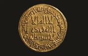 دينار أموي من الذهب ضُرب في سنة 106 هجريًّا (724 م) 
