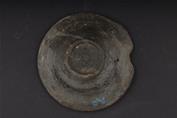 Plate with an outward-curved rim